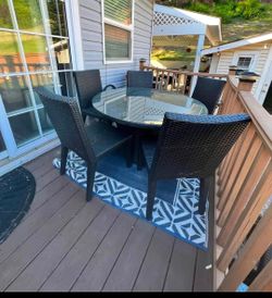Round glass top dining table