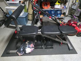Adjustable dumbells, bench, floor mat