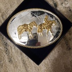 Belt Buckle. Cowboy Packing. Montana Silversmiths. 