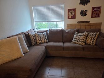 Gray sectional with chaise lounger