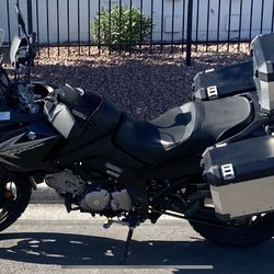 2011 Suzuki DL650A 2013 Yamaha Majesty 400