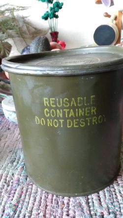 Vintage military container with camping supplies inside 👍