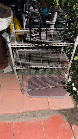 Silver storage rack slightly bent