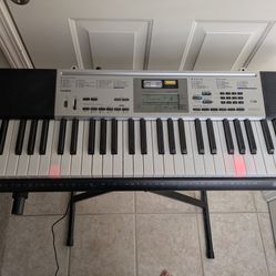 Casio Lighted Keyboard w/ Stand, Plug, Manual & Music