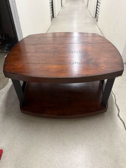 Ashley Furniture Challiman Round Coffee Table w Wheels . A Pair of Flexsteel Rustic Farmhouse Set Curved Dark Chestnut Wood End Tables