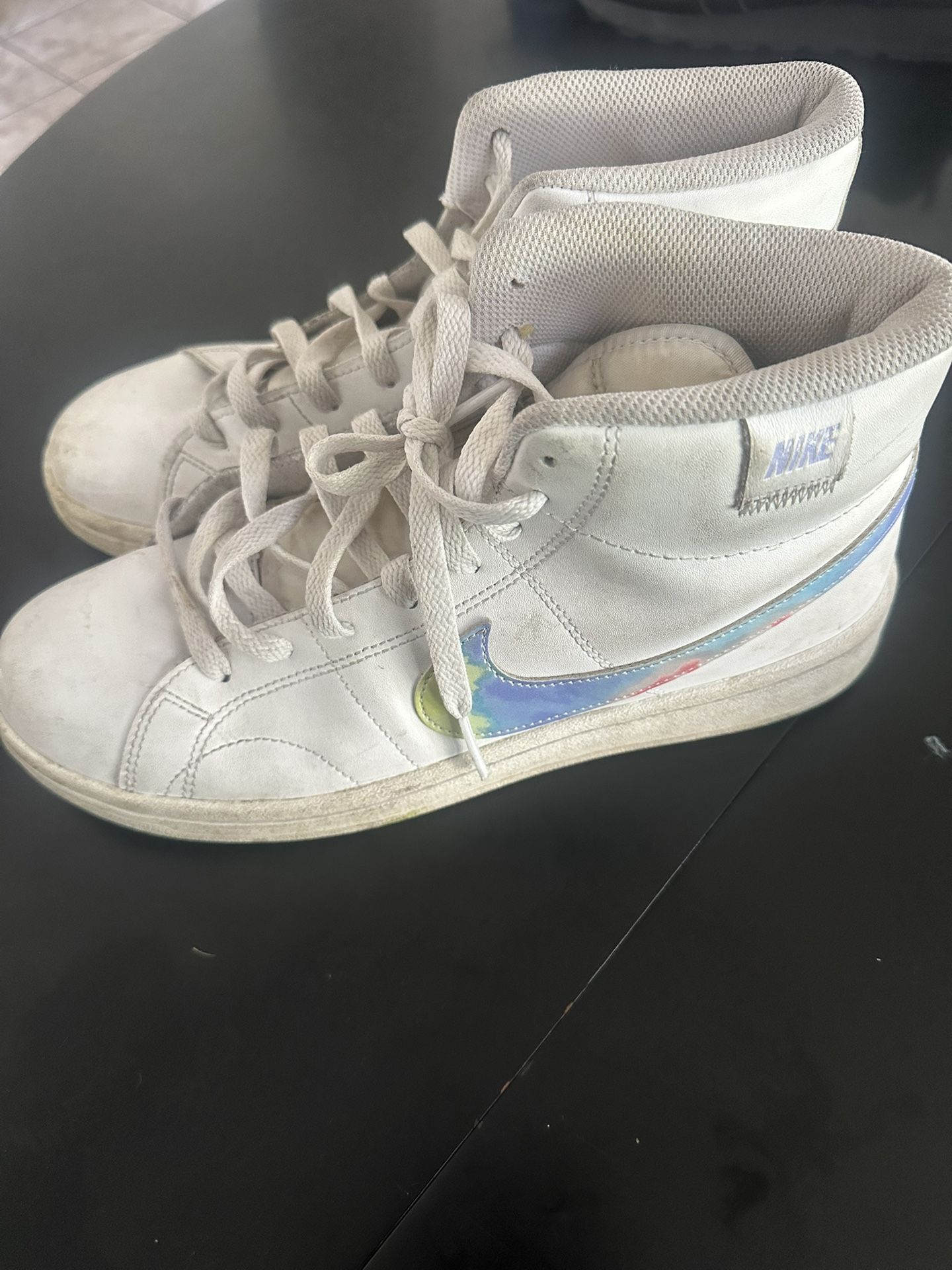 White And Multicolored Nike’s