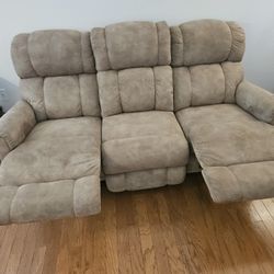 Tan Lazy boy sofa, recliner.