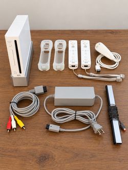 Nintendo Wii Bundle — 2 Remotes, Nunchuk & Cables