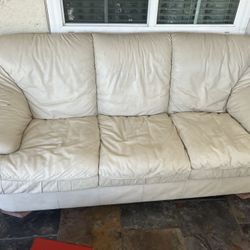 FREE genuine Jerome leather couch , both armrests ripped 