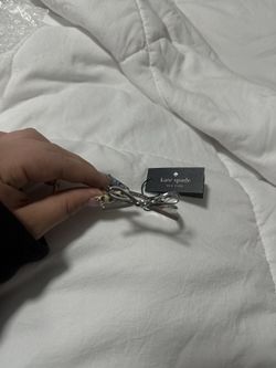 Kate Spade bow brace