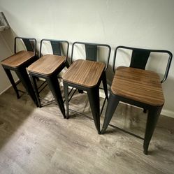 Set of four 24” metal bar stools