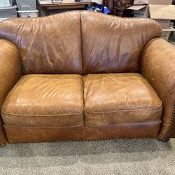 Pair Of Leather Love Seats