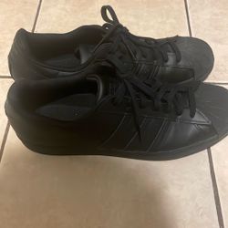 all black adidas superstars 