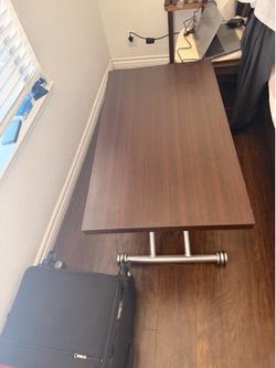Transforming lift-top coffee/dining table