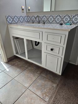 48 inch vanity w/top. Prefinished