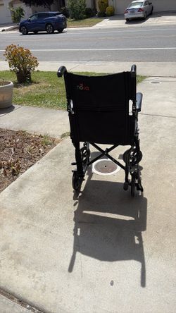 Wheelchair walker very good condition super light easy to curry and fold