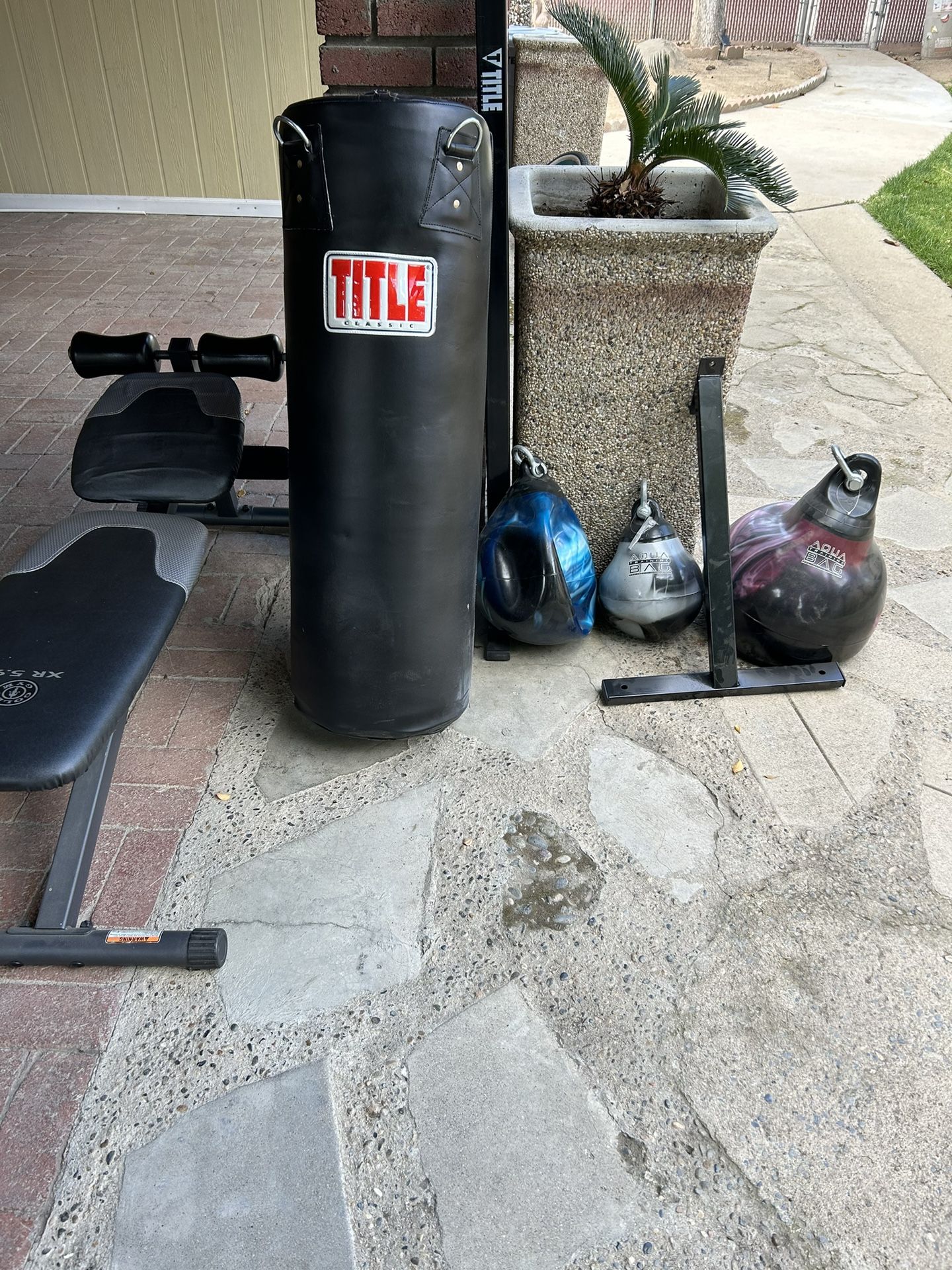 Punching Bag + Wall Stand New And Aqua Bags 