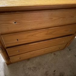 Wooden Dresser With Baseball Bats On The Side Free