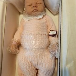 Baby Doll And Bassinet. Ashton Drake