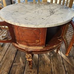 French style marble top end table
with wire doors 