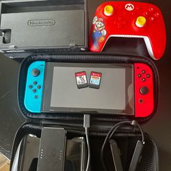 Nintendo Switch V2 Bundle with extra controller and 3 games.