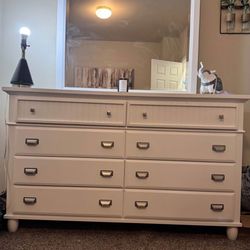 White and silver dresser set. 