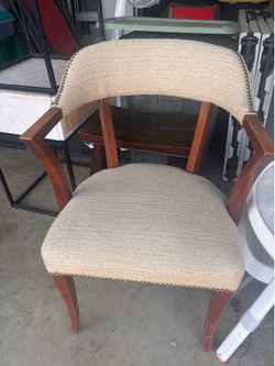 $40 cream wooden accent chair.