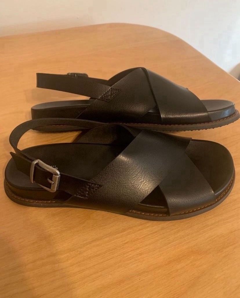 Black faux leather sandals