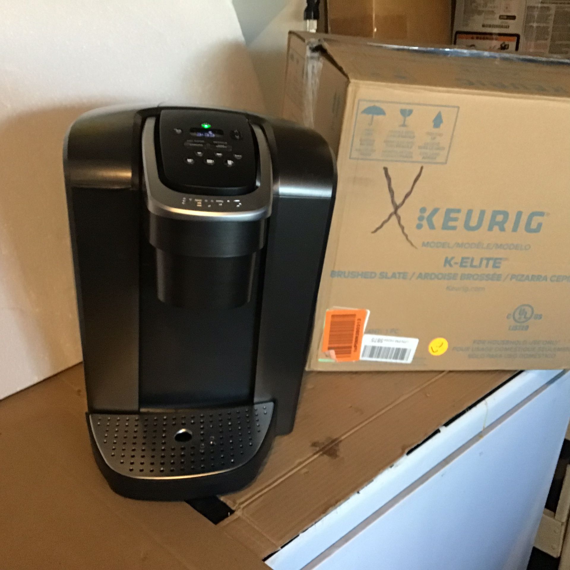 Keurig K Elite k cup single serve coffee maker open box excellent condition in original packaging. Never used