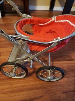 Antique doll buggy/ stroller