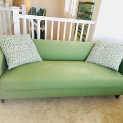 Green Sofa With Pillows 