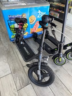 Brand new electric scooter with seat and basket