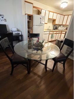 Round Glass Top Dining Table with Chairs