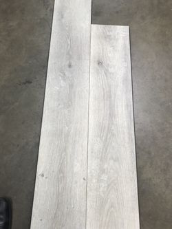 Waterproof floor with rubber pad attached