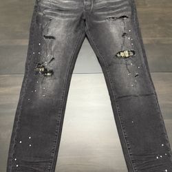 Amiri Black Distressed Patch Jeans Available sizes 30,34,38