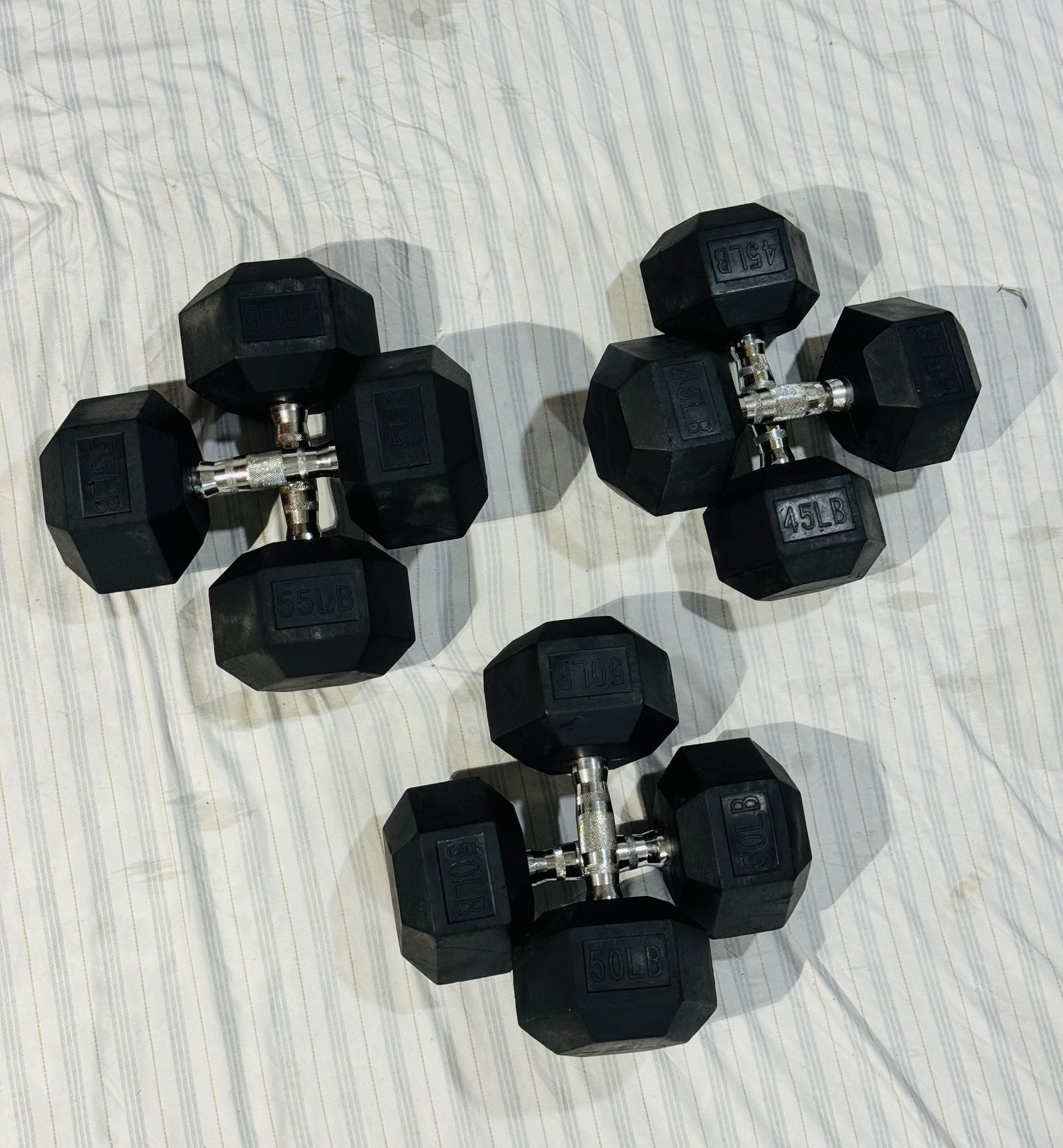 Dumbbells with Rubber Set  2x 55 Lbs, 2x 50 Lbs, 2x 45 Lbs