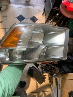 Dodge Ram Headlight Assembly passenger side