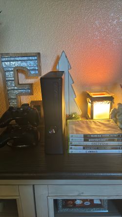 Xbox 360 with five games and two controllers
