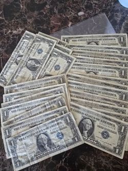 25 1935's & 1957's blue seal dollar notes