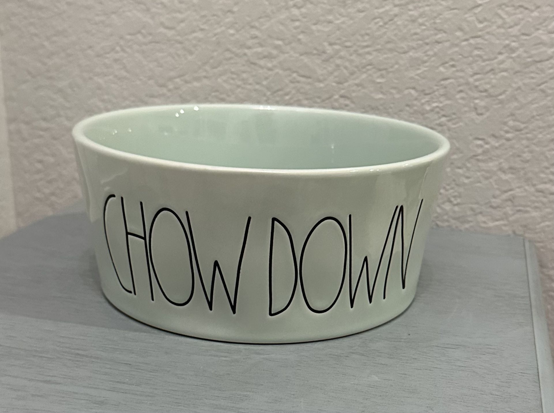 $10……New Rae Dunn large sz 8” diameter & and 3.5” deep CHOW DOWN dog bowl-Color is mint green. Please pickup in the area of 36th Ave and Pinnacle pea