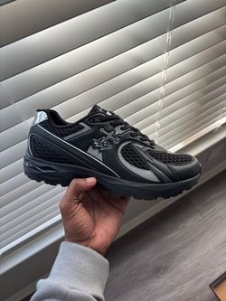 Black and Silver Low-Top Running Sneakers