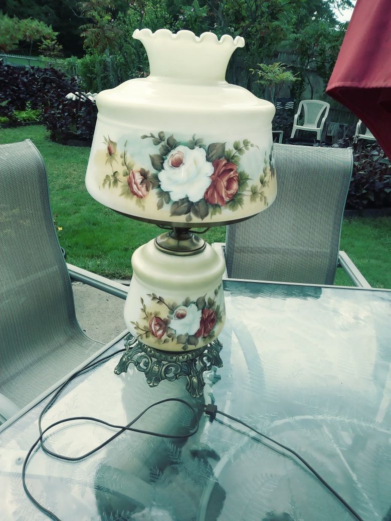 Beautiful large antique lamp with double lights one is the bottom night light top light or both on together