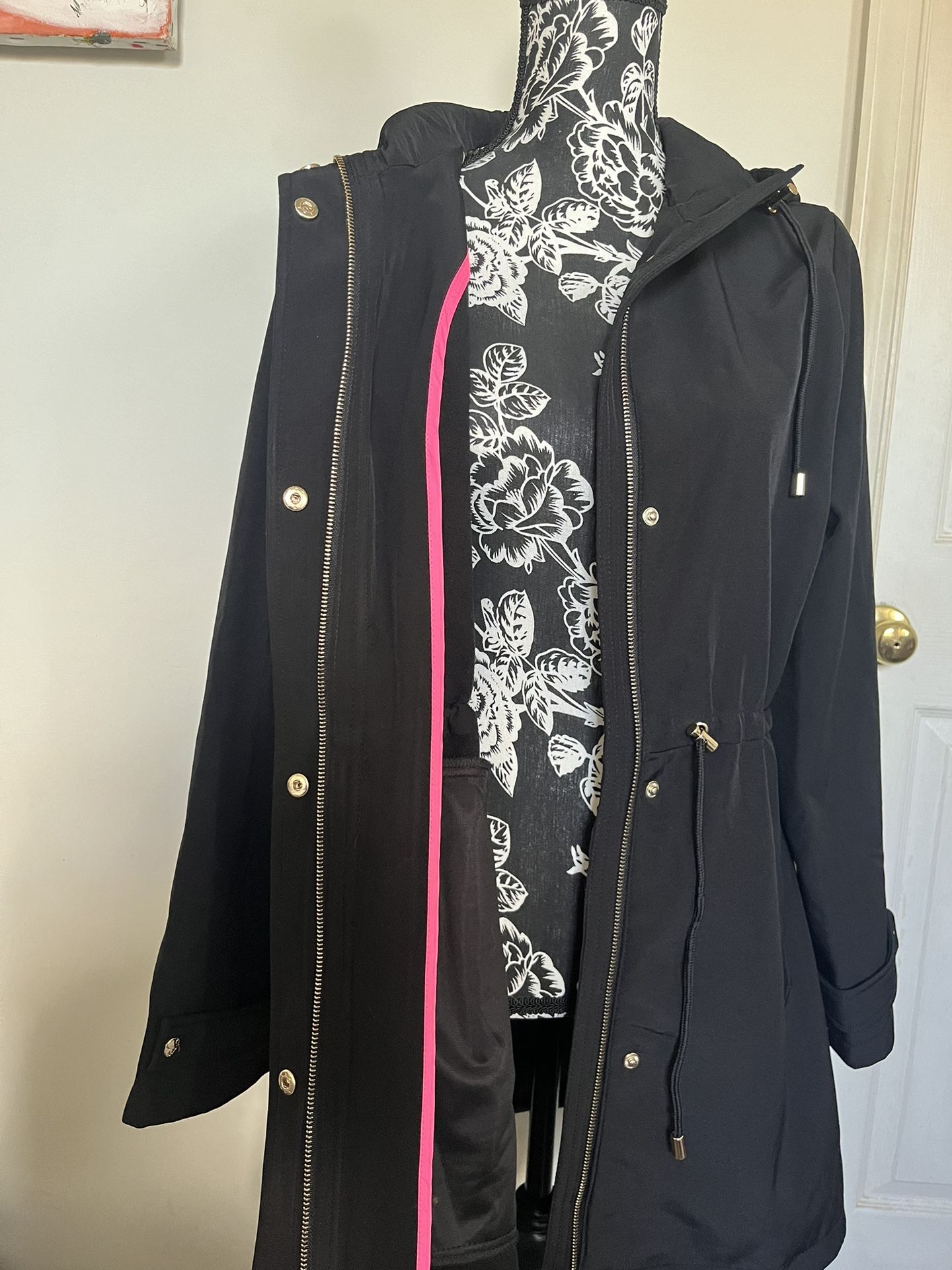 Black Short Woman’s Coat Size Large. Waterproof. Pleats in the back. New With Tags. Reg Price $195. Jessica Simpson. Comes from a smoke free environme