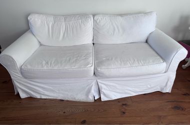 FREE white denim slipcovered sofa w/ down & feather cushions