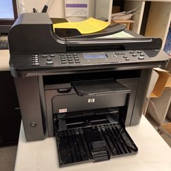 HP LaserJet 1536dnf MFP All-In-One Laser printer. NEW Cartridge 