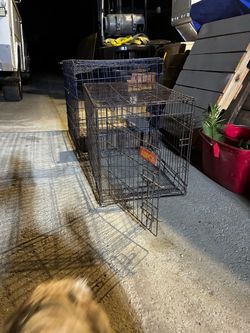 Animal cages 1 small, and one large sold together