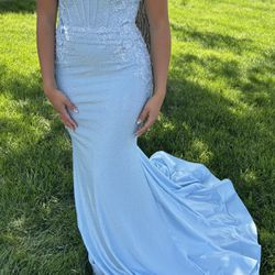 lcy Blue Sherri Hill Prom Dress. Tight fitted and corset back. Only worn once.
