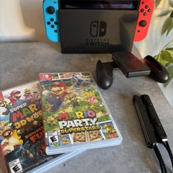 Nintendo Switch + Two Games 