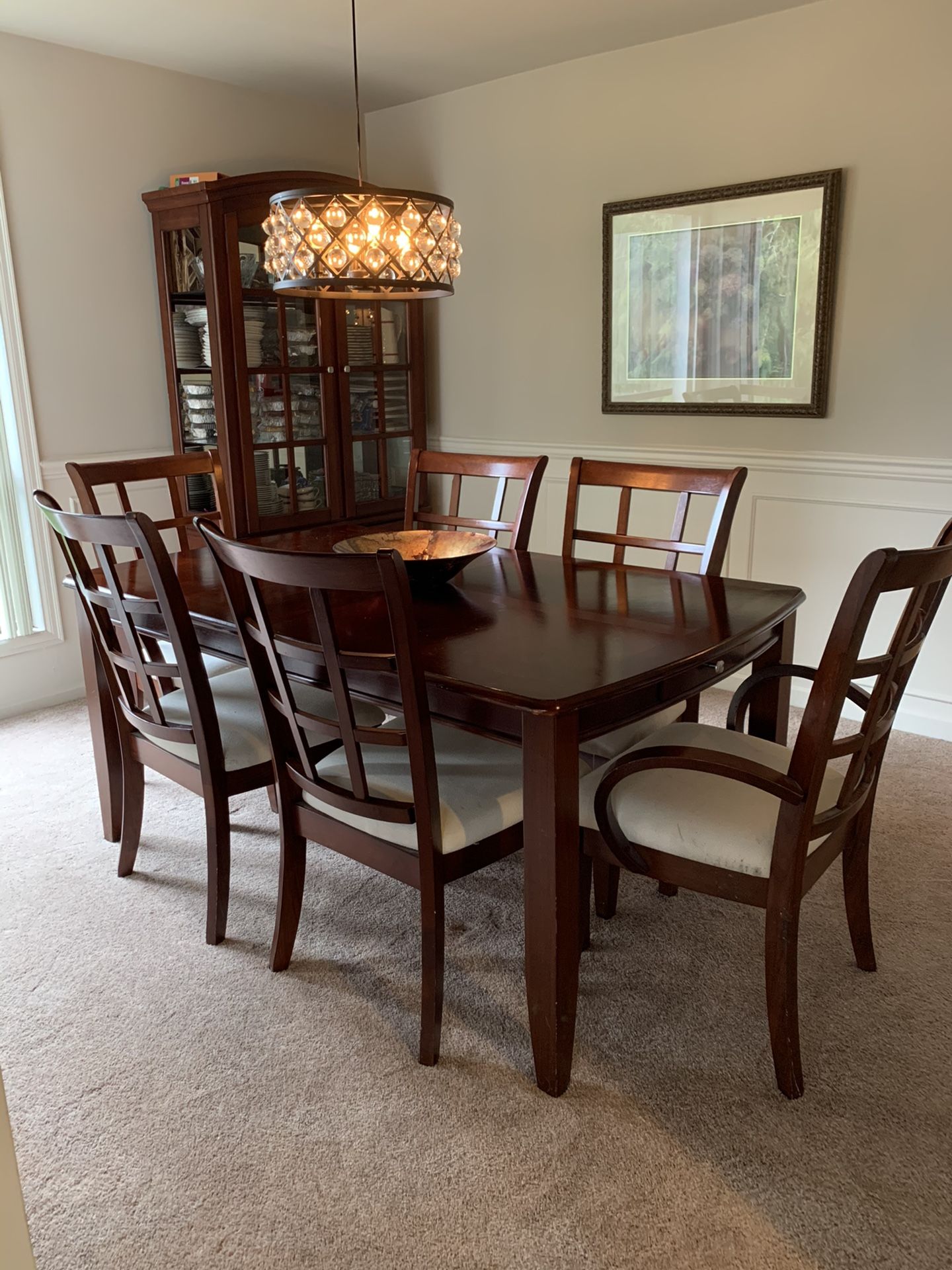 Dining Table. Walnut color. Solid. 6 chairs and expanding leaf included.