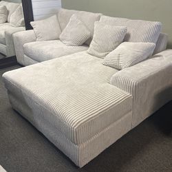 NEW COMFY SECTIONAL BEIGE AND BLACK AND FREE DELIVERY 